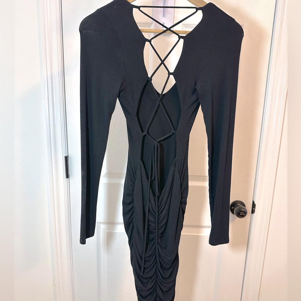 Long Sleeve, low back, corset style ties, ruched dress from Honey.